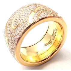 This ring comes with Chopard Certificate and Chopard box. Retail Price: $31,960 plus tax.  Metal: 18k Yellow Gold  Size: 6  Weight: 16.4 gramsz  Width: 11mm  Stones: Round brilliant cut diamonds VS1 clarity, G color  Hallmarks: Chopard 750 6209921 827531-5110      The dimensions field references the ring size and are not specific to the ring itself. Please read description for most accurate dimensions and use QA to inquire on any additional details. Luxury Diamond Ring With Polished Finish, Luxury Rose Gold Rings Stamped 14k, Designer Yellow Gold Diamond Ring, Designer Yellow Gold Rings For Everyday Luxury, Designer Everyday Luxury Yellow Gold Rings, Designer Yellow Gold Rings With Pave Setting, Fine Jewelry Yellow Gold Rings, Aaa Quality Fine Jewelry Yellow Gold Rings, Designer Yellow Gold Diamond Ring Hallmarked