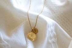 This locket necklace features a charming flower design and a flat circular shape. It serves as a keepsake for your most treasured memories, allowing you to insert a photo within it. Talk about a perfect gift idea! * How To Order 1. Choose the size. 2. Select initials, if you do not want any initial, select "NONE" (UPPER CASE and HEART Shape Available) if you want LOWERCASE please message me BEFORE placing the order!) 3. Add to cart and submit order :) * Locket : Photo Frame Pendant, Flat Round w Silver Medallion Necklace For Anniversary, Elegant Round Pendant Locket Necklace For Mother's Day, Elegant Charms Locket Necklace For Mother's Day, Medallion Necklace As Gift For Mom, Elegant Medallion Locket Necklace For Mother's Day, Round Medallion Necklace With Charms As Gift, Round Medallion Necklace With Charms For Gifts, Engraved Initial Pendant Medallion Necklace For Gift, Elegant Round Locket Necklace For Mother's Day