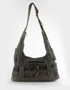 Vintage Denim Bag. Denim Shoulder Bag Featuring Oversized Buckle Details. Shoulder Strap With Adjustable Buckle. Main Compartment With Zip Closure. Exterior Zip Pocket. 2 Exterior Side Pockets. Exterior Belt With Buckle Allows You To Customize The Bag. Approximate Bag Dimensions: 15" (w) X 8" (h) X 3.5" (d). 100% Cotton. Imported. Cool Vintage Belts, Outfit With Crossbody Bag, Y2k Coach Bag, Denim Purses And Bags Old Jeans, Pirate Bag, Shoulder Bags Aesthetic, Bag Customization