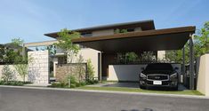 a black car parked in front of a modern house with an attached carport and driveway