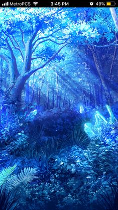 an image of a blue forest scene with trees and plants in the foreground, on a cell phone screen