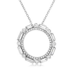 14K white gold diamond circle pendant from the Reis-Nichols Collection. The necklace features eight baguette diamonds and 48 round brilliant cut diamonds weighing over 1/2 ctw (.50-.65). The necklace measures 16" in length. Luxury Round Diamond Cut Birthstone Necklace, Luxury Round Cut Diamond Necklace With Pave Setting, Silver Necklaces With Baguette Diamonds, Anniversary Diamond Necklace With Baguette Diamonds, Anniversary Baguette Diamond Necklace, Silver Diamond Necklace With Round Baguette Diamonds, Diamond White Necklace With Baguette Diamonds, Fine Jewelry Diamond Necklace With Baguette Diamonds, Round Baguette Diamond Necklace For Anniversary