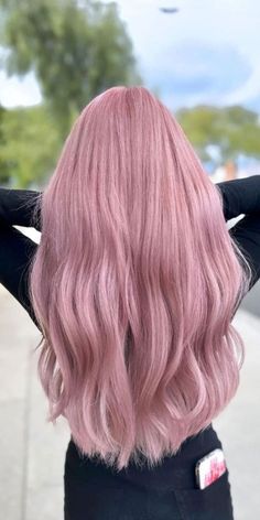 For a cool and icy appearance, consider icy pink hair. It's a unique and daring choice that's perfect for the fearless. Dark Dusty Rose Hair, Candy Pink Hair Color, Washed Pink Hair, Dusty Light Pink Hair, Pink Blonde Hair Highlights, Bubblegum Pink Hair Cotton Candy, Light Pink Hair With Brown, Rose Quartz Hair Color, Pink Hair Fair Skin