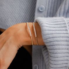 Is there anything better than when something is as comfortable as it is stunning? Our Ava Bea Flexi Cuff is made from flexible 14 karat gold and features a row of round diamonds set in faceted 14k white gold for extra sparkle. Comfortable and chic, this delicate diamond cuff bracelet is an instant classic. Previously a showroom exclusive, we are thrilled to bring this fan-favorite piece to our website. Style this flexi-cuff with your favorite station bracelet for a fun stack or wear it solo - ei Diamond Cuff Bracelet, Dana Rebecca Designs, Station Bracelet, Round Diamond Setting, Kids Bracelets, Buddha Pendant, Bridal Engagement Rings, Climber Earrings, Solitaire Studs