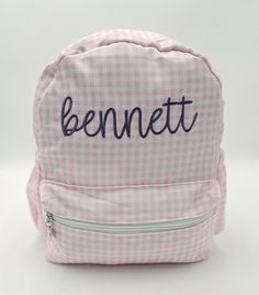 These custom embroidered backpacks are adorable for your little one and the perfect size for a diaper bag or daycare/preschool! Details: - One zipper pocket in the front as well as small pockets on either side of the backpack. - Size: 13" long x 10" wide x 3.5" deep Gingham Backpack For Everyday Use And Back To School, Back To School Gingham Backpack For Everyday Use, Back To School Gingham Bags, Cute Cotton Backpack For Back To School, Gingham Standard Backpack For School, School Backpack In Gingham, Gingham School Bag For Back To School, School Backpack In Gingham Pattern, Preppy Gingham School Bag