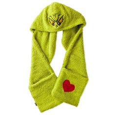 You'll be wearing a Grinchy grin whenever you enjoy winter activities in this handy hooded scarf. Cozy green scarf features a Grinch face embroidered on the hood and includes two large pockets on the ends of the scarf for warming your hands or carrying necessities. A red heart-shaped appliqué on one of the two pockets adds heartwarming charm to the soft fleece scarf. It makes a fun gift for a teacher, college kid or Grinch fan. | Green Grinch hooded scarf features embroidered and appliqué accents on the hood and one pocket. | Makes a great gift for Grinch fans. | Imported. 100% polyester. | Hand wash. Do not bleach. Hang to dry. Do not iron. Do not dry clean. | 68'' L Hooded Scarf With Pockets, Scarf With Pockets, Grinch Face, The Grinch Stole Christmas, Enjoy Winter, Fleece Scarf, College Kids, Grinch Stole Christmas, Green Scarf