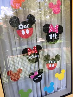 mickey and minnie mouse birthday decorations in the window