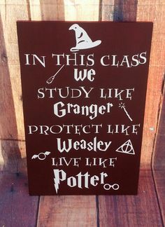 a wooden sign that says in this class we study like grandpa protect like weasely live like potter