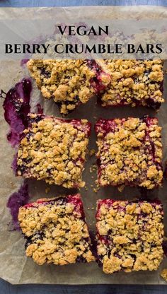 vegan berry crumble bars on parchment paper