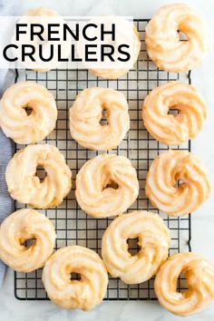 fresh baked french crullers on a cooling rack