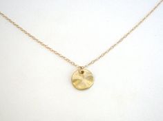 Minimalist Brass Coin Necklace With Round Pendant, Minimalist Brass Coin Necklace As Gift, Simple Jewelry With Delicate Chain And Round Disc, Simple Gold Charm Necklace With Round Disc, Simple Round Disc Necklace With Delicate Chain, Simple Gold Round Disc Necklaces, Simple Gold Round Disc Necklace, Simple Gold Nickel-free Necklace, Silversmithing Jewelry