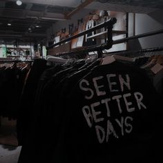 there is a sign that says see better days on the back of a t - shirt