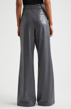 Get your groove all the way on in faux leather pants that serve all the supple swagger of the real deal. 35" inseam; 26" leg opening; 11 1/2" front rise; 15 1/2" back rise (size 8) Zip fly with hook-and-bar closure 100% polyurethane Dry clean Imported Flare Leg Pants, Faux Leather Pants, Nordstrom Store, Fabric Gifts, Free Fabric, Alice Olivia, Leg Pants, Leather Pants, High Waist