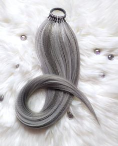 Ponytail Hair Extensions, Synthetic Hair On Elastic Band " Silvery Lady " Type: hair on elastic rubber band, ponytail, hairpiece, hairband, wig Material: synthetic hair (henlon), elastic band Method: handmade Texture: straight Lenght: choose the length in the listing options  Volume: choose the volume in the listing options Colors: blended colors: white, grey, grapphite grey If you want to order a different colors, lenght, volume, or size,  you can ask me about "Custom Order " How to put it on: Grey Ponytail, Blended Hair, Pink Dreads, Grey Hair Extensions, Grey Hair Wig, Hair Falls, Plaits Hairstyles, Mixed Hair, Ponytail Hair Extensions