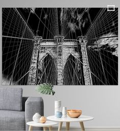 a black and white photo of the brooklyn bridge in new york city, ny on canvas