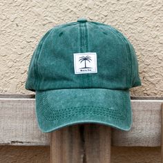 * Vintage style faded cotton dad cap * Unisex * Adjustable strap * Custom designed BURA woven patch on front * Perfect for outdoor adventures! Cotton 5-panel Trucker Hat For Beach, Casual Trucker Hat With Curved Bill For Outdoor, Casual Curved Bill Trucker Hat For Outdoor, Casual Dad Hat For Summer Outdoor Activities, Casual Six-panel Travel Hats, Green Adjustable 5-panel Dad Hat, Adjustable Green 5-panel Dad Hat, Cotton Trucker Cap With Logo Patch, Trucker Style Cotton Baseball Cap With Logo Patch