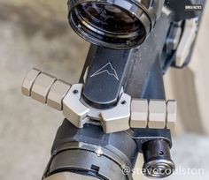 a close up view of the handlebars on a bike with a camera attached to it