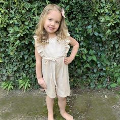 Welcome spring and summer with this adorable romper. Made with beautiful linen fabric. Romper has shorts with snaps at the bottom for easy bathroom breaks. Rompers have functional buttons in back and a tie around the waist. Fits true to size.Sizes 2T-5T Beige Linen Summer Jumpsuits And Rompers, Spring Cotton Jumpsuits And Rompers For Playwear, Summer Vacation Bubble Romper With Ruffles, Cotton Bubble Romper With Ruffles For Vacation, Casual Bubble Romper For Spring Playdates, Vacation Cotton Bubble Romper With Ruffles, Summer Bubble Romper For Spring Playdate, Casual Spring Bubble Romper For Playdate, Summer Bubble Romper For Playdate In Spring