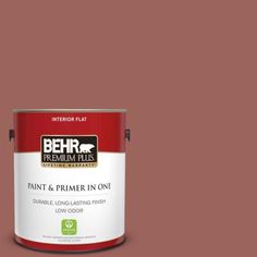 a pink paint with the words behr premium plus on it