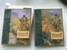 two cards with plants on them sitting next to each other