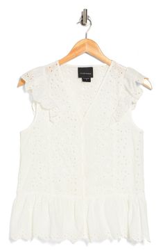 Intricate eyelet embroidery punctuates a breathable pure-cotton top framed with cap sleeves. 22" length (size Small) Front button-and-loop closure V-neck Cap sleeves 100% cotton Hand wash, line dry Imported Sleeveless Eyelet Top For Spring, Cotton Eyelet V-neck Top, Eyelet Embroidery, Concert Looks, Cap Sleeve Top, Training Tops, Designer Crossbody Bags, Sweaters And Leggings, Suit Shop