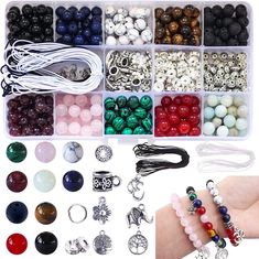 various beads and bracelets are arranged in a box