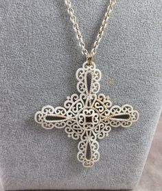 "RaRe CROWN TRIFARI Stylized Maltese Cross Necklace on Original 28\" Chain Late 60's / Early 70's White Enameled Jewelry This rare, ornate, and exquisite quality Crown Trifari piece is just gorgeous. It measures approx. 3 1/4\"\" Wide x 3 1/4\" long on a 28\" chain.  It is white with gold details (see photos).  It has the tiny hanging Crown Trifari Logo by the clasp. In excellent condition.  It is in wonderful condition!  International shipping to some countries is available. Please contact for Enameled Jewelry, Crown Trifari, Maltese Cross, Enamel Jewelry, White Enamel, Maltese, Gold Details, Gold Accents, Cross Necklace