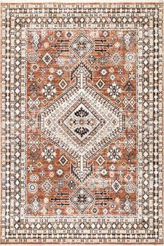 an orange and beige area rug with geometric designs on the bottom, in front of a white background