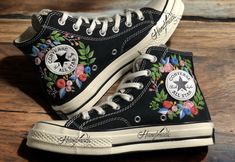 Custom wedding converse/Bridal flower embroidered shoes/Custom converse high tops embroidered flower /Wedding flower embroidered sneakers  💸 Price includes Converse Shoes and floral embroidery as shown 🌸 You can send me your Converse/Vans shoes or I can buy them for you. We stock all the Converse and Vans shoes you want, if you want other Converse/Vans shoes in the store, please message us. Your embroidered Converse/Vans shoes will be available for shipping in 7-15 days. 🌸 I started hand embroidering on fashionable clothes and handbags over 20 years ago - and now on CONVERSE/VANS shoes, an American icon, a must-see classic! I'm excited to give your Chuck Taylor shoes a new look with beautiful, nature-inspired embroidery. All images, designs and text used by CUSTOMSHOEDESIGNSOHO are copy Spring Wedding High-top Sneakers, Flower Custom Converse, Summer Embroidered High-top Sneakers, Summer High-top Sneakers With Floral Embroidery, Converse Embroidery Floral, High-top Floral Embroidery Sneakers For Summer, Black High Top Converse Embroidery, Black High-top Sneakers With Floral Embroidery, Custom Converse High Tops