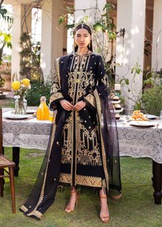 Black Pakistani Party Dress in Salwar Kameez Style in lawn is beautifully adorned with embroidery work and looks stunning when paired with a black organza dupatta. Detailed Description: SKU: PS2454 Detailing: Embroidery, Floral designs, Threads Color: Black Fabric: Organza, Lawn Design: Fully Embellished Dress with Embroidery Event: Bridal wear, Wedding Salwar Kameez Style, Akbar Aslam, Kameez Style, Lawn Design, Pakistani Party Wear, Pakistani Lawn Suits, Pakistani Salwar Kameez, Pakistani Wedding Dresses, Lawn Suits