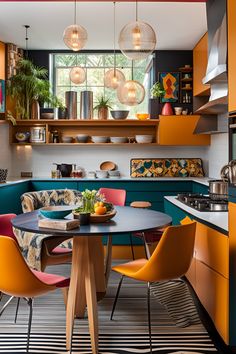 a kitchen with orange and blue chairs around a table