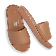 PRICES MAY VARY. Womens Sandals - Pair FitFlop Women's iQushion D-Luxe Padded Leather Slides Sandals with sundresses or denim for a laid back summer look. From beach days to brunch outings, these stylish and comfortable womens shoes effortlessly complement your warm weather wardrobe. Slip On Style - Low-maintenance and easy to clean, these slip on sandals allow ease of movement. Their simple, elegant style suits diverse settings, the single leather front strap ensures quick relief when slipping Comfortable Womens Shoes, Suede Slides, Comfort Shoes Women, Slip On Sandals, Leather Slide Sandals, Slides Sandals, Leather Slides, Comfortable Sandals, Simple Elegant