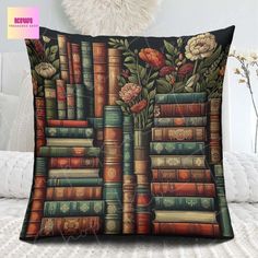 a pillow with books and flowers on it