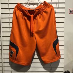 Under Armour Orange And Gray Shorts With 2 Front Pockets And Elastic Waist With Draw String Size Youth Xl Under Armour Summer Shorts With Pockets, Orange Sporty Shorts For Summer, Sporty Orange Shorts For Summer, Casual Orange Bottoms With Built-in Shorts, Under Armour Casual Athletic Shorts With Elastic Waistband, Orange Sports Shorts With Pockets, Casual Under Armour Athletic Shorts With Elastic Waistband, Orange Cotton Sports Bottoms, Sporty Orange Cotton Bottoms