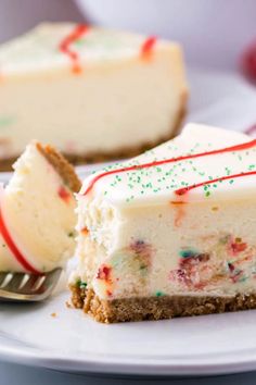 a slice of birthday cake with sprinkles on a plate next to a fork