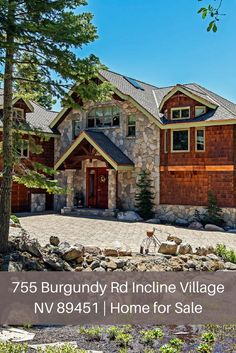 a house with a purple sign that says in the presidious lake tahoe community of incline village, a luxury home is waiting for you