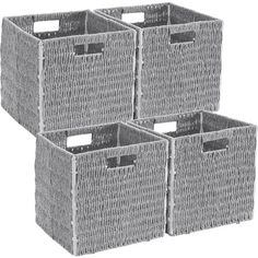 four grey wicker storage baskets with handles