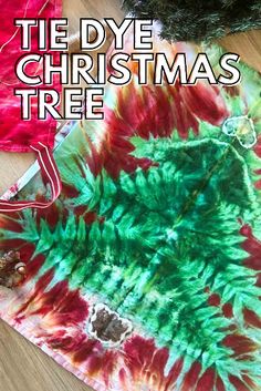 tie dye christmas tree on the floor with text overlay