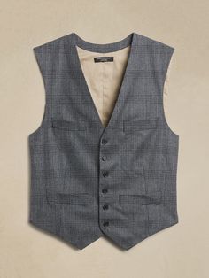 A coveted style since the 19th century, a waistcoat vest is the final touch to sophisticated suited styles.  Ours is cut from a warm, luxurious Italian wool fabrication with signature khaki lining.  It's no wonder this silhouette was popularized by r Sleeveless Tailoring Vest With Welt Pockets, Classic Sleeveless Vest For Semi-formal Occasions, Classic Sleeveless Semi-formal Vest, Classic Tailored Vest For Fall, Semi-formal Sleeveless Vest For Fall, Tailored Wool Vest, Tailored Wool Sleeveless Vest, Tailored Sleeveless Wool Vest, Tailored Wool Vest For Semi-formal Occasions