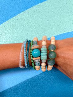 The Twine & Twig Simple Stack is designed using globally sourced beads. They can be worn individually or stacked up. Fits wrist size 7". Twine And Twig, Beachy Vibes, Green Shades, Crystal Clear Water, Blue Tones, Bracelet Stack, Blue Hues, How To Make Beads, Making Jewelry