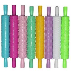 several different colored plastic objects lined up in a row