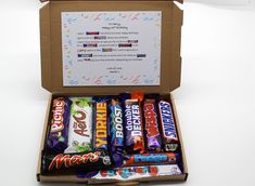 an open box filled with different types of candy