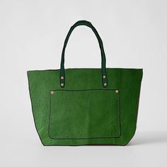 The Leaf Cypress Market Tote is a large bag made of beautiful full-grain leather. Leaf Cypress is a thick and soft leather, with a pillowy texture, even color with little to no pull-up, pebbled grain, and a vibrant green color. The Leaf Cypress Market Tote comes standard with Green handles. Tote Beach Bag, Leather Leaf, Large Leather Tote Bag, Leather Tote Bags, Work Tote, Large Leather Tote, Weekend Bag, Market Tote, Tote Bag Leather