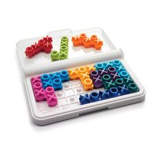 two plastic trays filled with different colored toy blocks and letters on top of each other