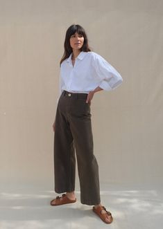 An iconic sailor pant design constructed from fine cotton canvas that's structured and keeps its shape. They feature a slim fit in the waist and hips with a high rise. Finished with a button front, on-seam welt pockets and darted at the waist for fit. High Summer Fashion, Relaxed Fit Cotton Work Pants With Button Closure, Chic Wide Leg Cotton Pants For Work, Cotton Bottoms With Button Closure For Daywear, High Waist Cotton Chinos For Business Casual, High-waisted Cotton Chinos For Work, Fall Cotton High-waisted Work Pants, Fall High-waisted Cotton Work Pants, Chic Cotton Pants With Button Cuffs