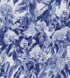 blue and white flowers are shown in this artistic painting