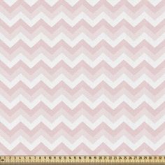 pink and white zigzag print fabric with a ruler on the bottom side