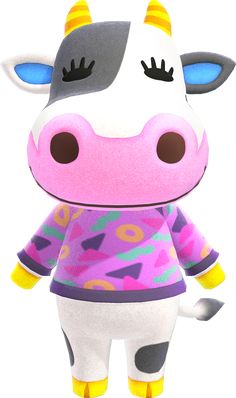 a stuffed cow is standing in front of a white background and wearing a colorful shirt