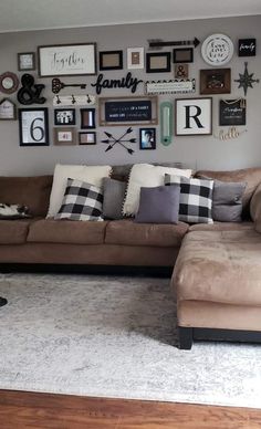 a living room filled with lots of furniture and pictures on the wall above it's couch