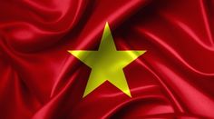 the flag of china is waving in the wind and it looks like silky fabric with a gold star on top